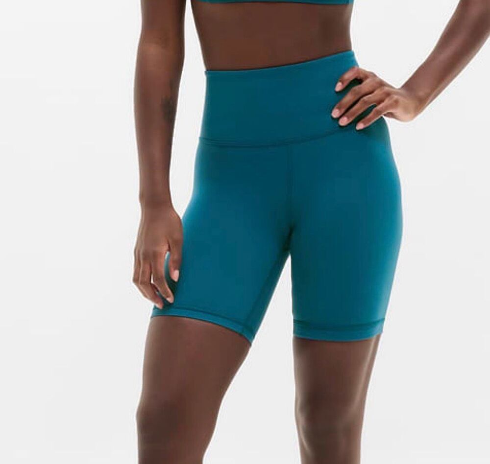 Athleta Elation ultra high rise 7” bike shorts in coastal teal size XXS